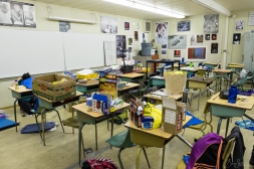 The breakfasts of champions clutter the classroom after the sleepover.